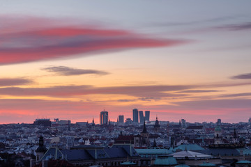 Fototapeta na wymiar Beautiful sunrise over Prague from Letenske sady with view on Skyscrapers, The capital of Czech Republic
