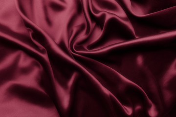 Elegant red satin silk with waves, abstract background