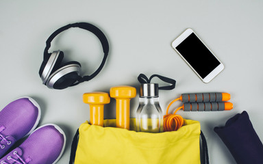 Creative flat lay of sport and fitness equipments