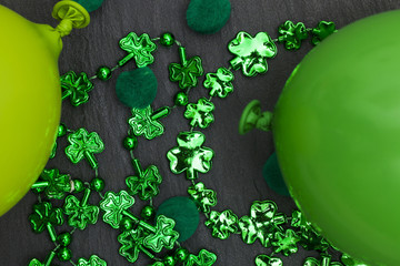 St Patrick's day background with green balloons and shamrock