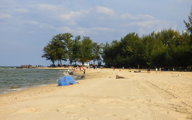 Tourists at Samila beach in Songkhla, Thailand
