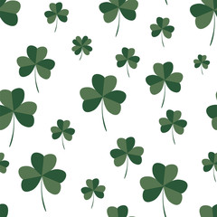 Floral seamless pattern with a green clover on a white background. St.Patrick 's Day. Vector.