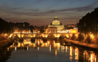 Fototapeta na wymiar View at Tiber and St. Peter's cathedral in Rome, Italy