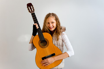 Fototapeta premium Girl playing guitar
