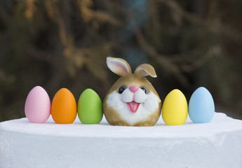 Easter eggs and a toy rabbit