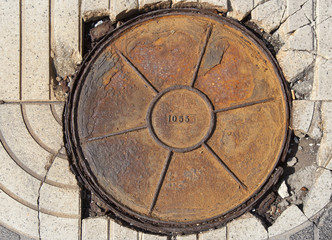 round manhole number 1055