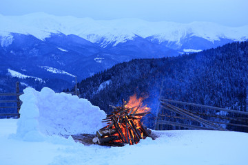 Fire in the mountains in winter