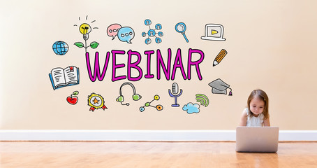 Webinar text with little girl using a laptop computer on floor