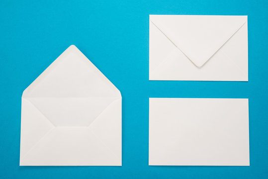 White envelopes on a blue background 