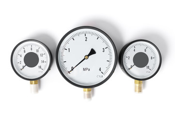 The pressure sensor in the pipeline is a manometer. Three gauges of different sizes on a white isolated background