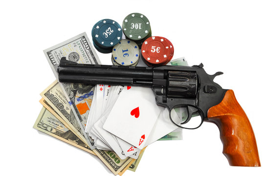 Money dollars and euro. Cards and chips for poker, gun revolver. On a white background.