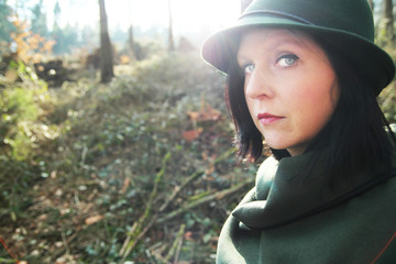Outdoor adventure tour in green dress with hat