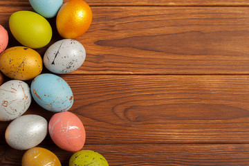 Happy easter! Easter eggs on wooden background