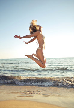 Jumping at the beach
