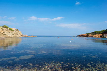 Cala pou des lleo in ibiza with a blue sky