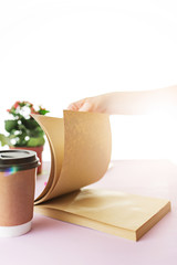 The business woman in the workplace flips through the dailybook