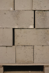 Cement blocks on a market place at day.