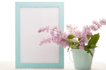Blank board and Lilac flowers.