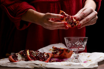  Pomegranate in hands - deseeding