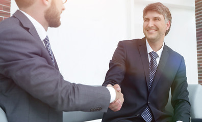 Handshake manager and attorney in the office