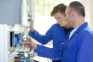 technician operating advanced technology