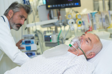 doctor examining his patient
