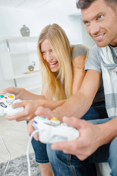 Two friends playing video games