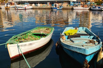 Fototapeta na wymiar Fishing boats moored in the port