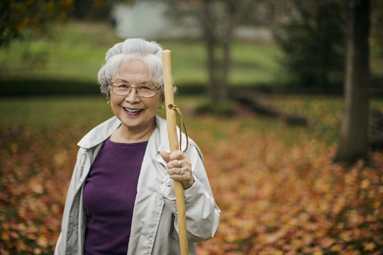 Portrait of a smiling senior woman at the park.