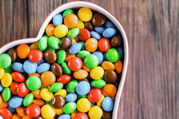Round candy in a multicolored glaze.