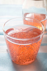 Basil seed infused drink with pomegranate flavouring 