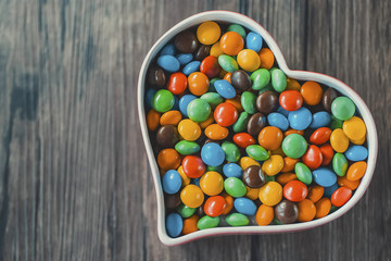 Round candy in a multicolored glaze.