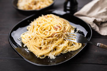 Spaghetti carbonara with egg and pancetta