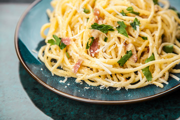 Spaghetti carbonara with egg and pancetta