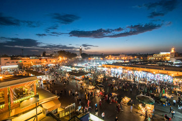 Famous Moroccan market square Jamaa el Fna in Marrakesh medina quarter, called also Jemaa el-Fnaa, Djema el-Fna or Djemaa el-Fnaa