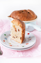 Traditional German Easter Bread, Osterbrot, made of Brioche yeast dough with raisins, eggs, milk, flour, yeast, sugar and butter baked in small saucepan served for Easter Sunday breakfast or brunch