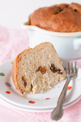 Traditional German Easter Bread, Osterbrot, made of Brioche yeast dough with raisins, eggs, milk, flour, yeast, sugar and butter baked in small saucepan served for Easter Sunday breakfast or brunch