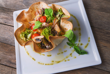 vegetable stew with meat and mushrooms in tasty dishes