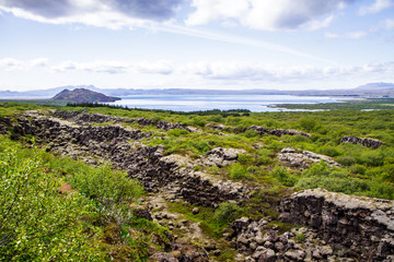 Rocky shore and river in the national park. Thingvellir in Iceland