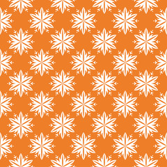 White floral seamless pattern on orange background