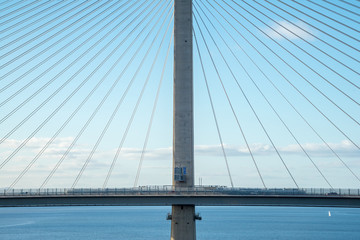 The new Queensferry Crossing Bridge, viewed from the west footpath of the old Forth Road Bridge, showing the cable-stayed construction.