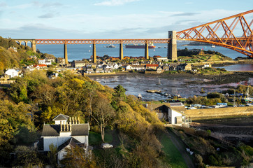 A view from the east footpath of the Forth Road Bridge, looking over North Queensferry towords the old and famous Rail Bridge. - 193186880