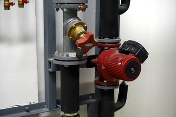 Red Circulation Pump and a balancing valve