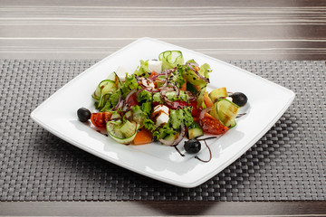 Plate with fresh greek salad