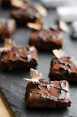 cooking homemade chocolates in chocolate glaze in the workshop. Master Class
