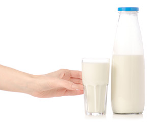 A bottle of milk a glass of milk in hands