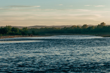 Sunset landscape upon the river