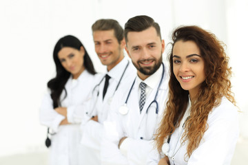 portrait of female doctors with colleagues
