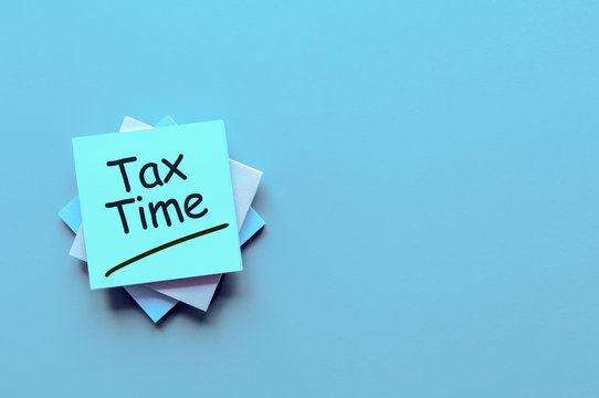 Tax time - message on an office desk with empty space for text, mockup or template