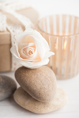 peach candle holder, rose, pebbles